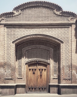 A stylish entrance door with intricate design details, highlighting craftsmanship