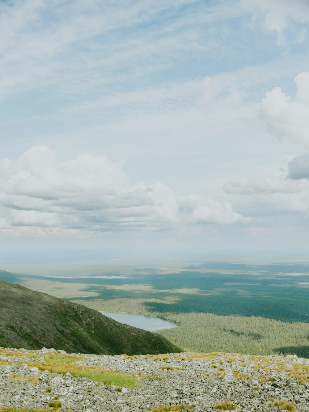 a person standing on top of a hill