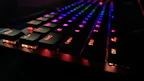 Close-up of a mechanical gaming keyboard with vibrant backlighting