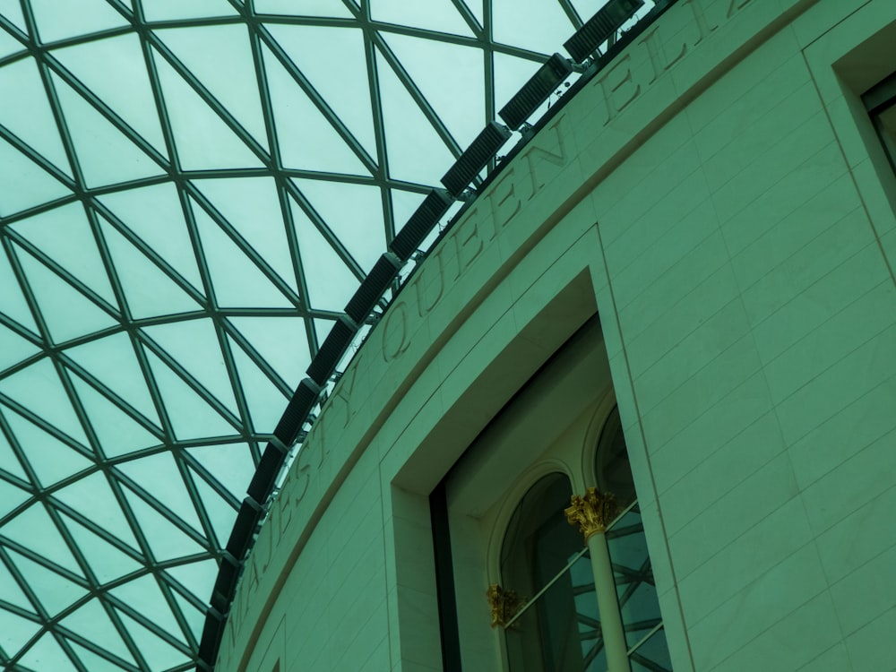 a close up of a building with a glass roof