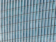 Wide shot of a sturdy metal window frame installed in a modern building facade.