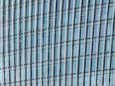 Close-up of a sleek metal window frame installed in a modern building.