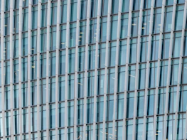 Wide shot of a modern glass storefront system installed by BDEI on a commercial property.