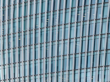 Close-up of modern aluminum window frames installed on a commercial building.