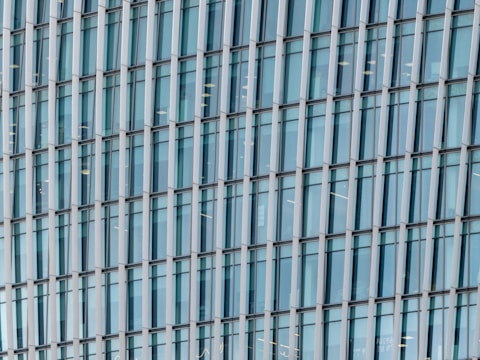 Close-up of a storefront glass system with clean metal framing and clear visibility inside.