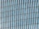 A close-up of a beautifully installed window film on a modern building.