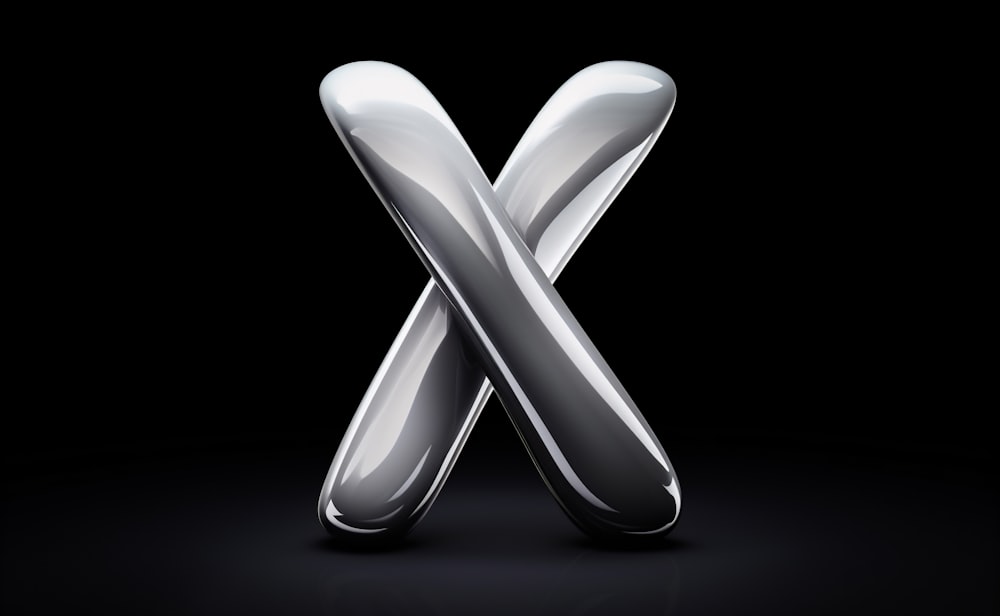 the letter x is made up of shiny metal