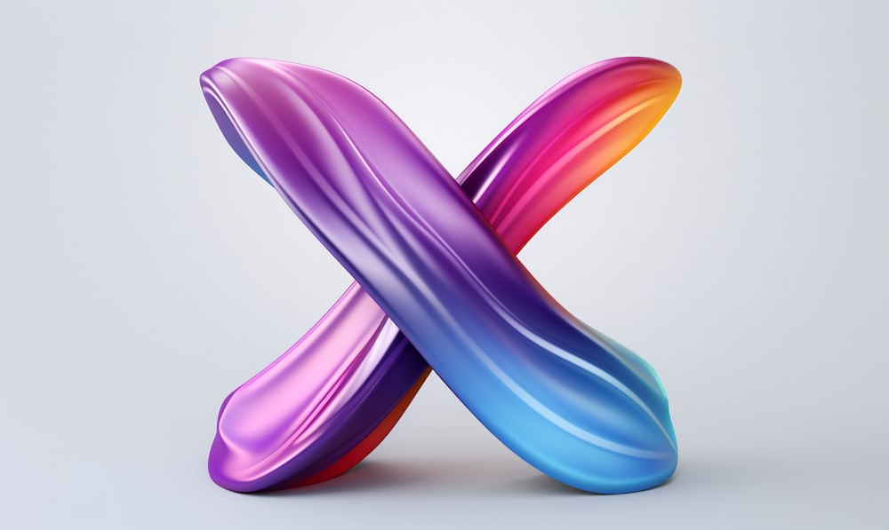 a colorful x - shaped object on a white background