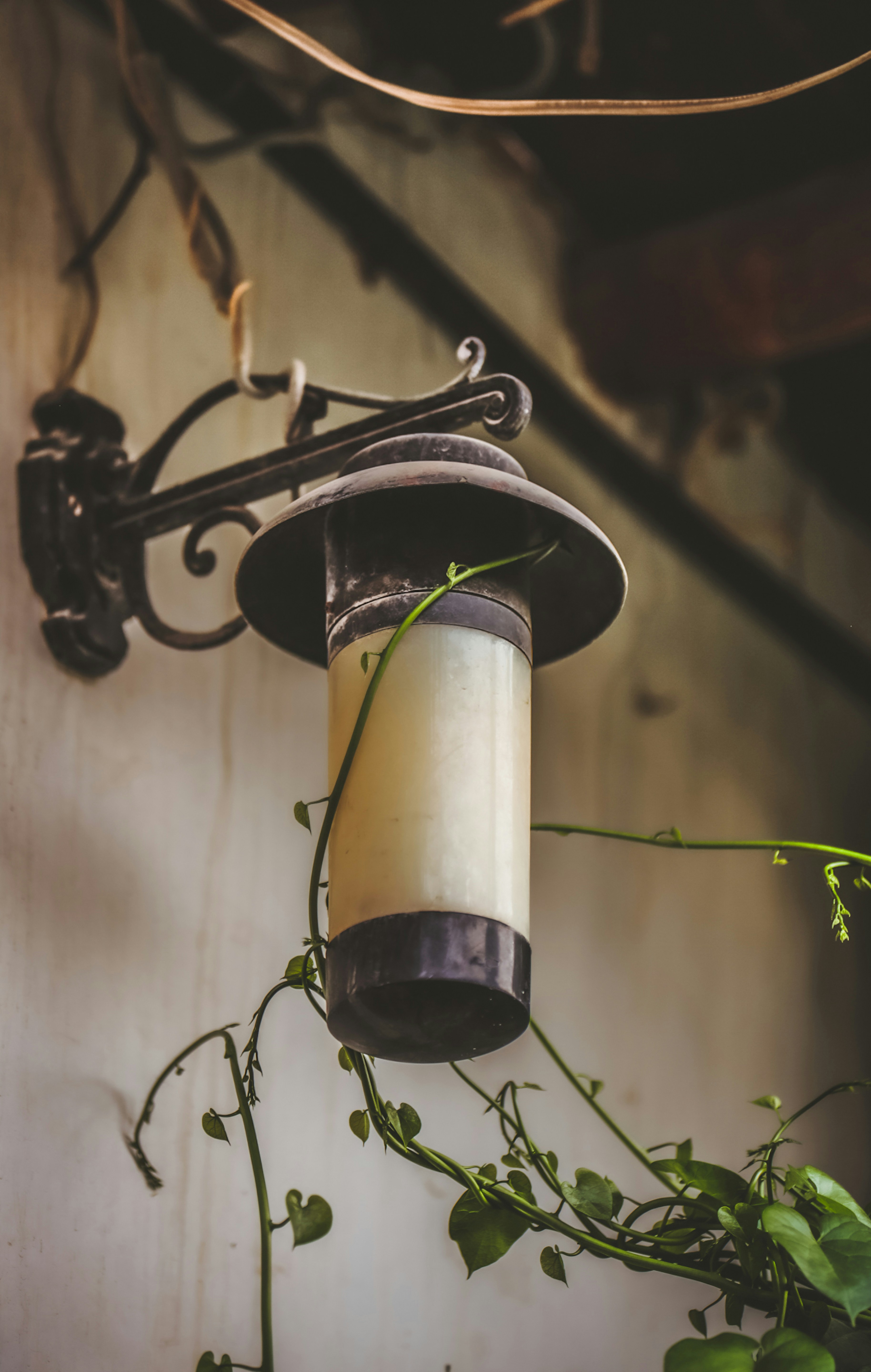 a light hanging from the side of a building
