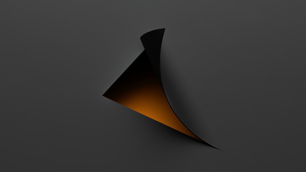 a black and orange background with a curved corner