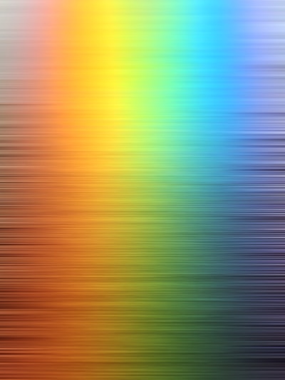 a blurry image of a rainbow colored background