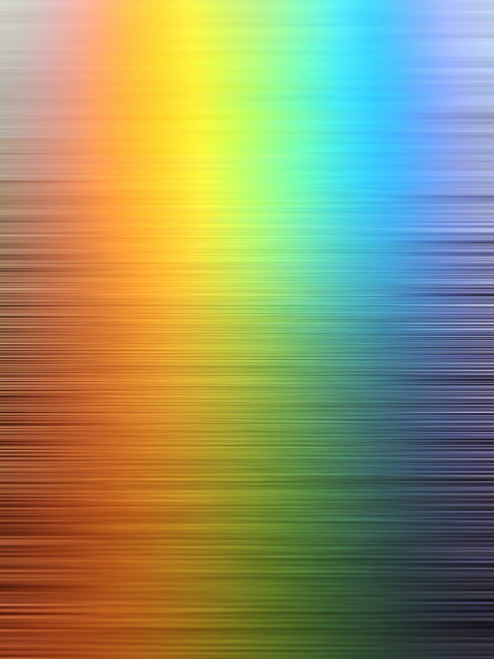 a blurry image of a rainbow colored background