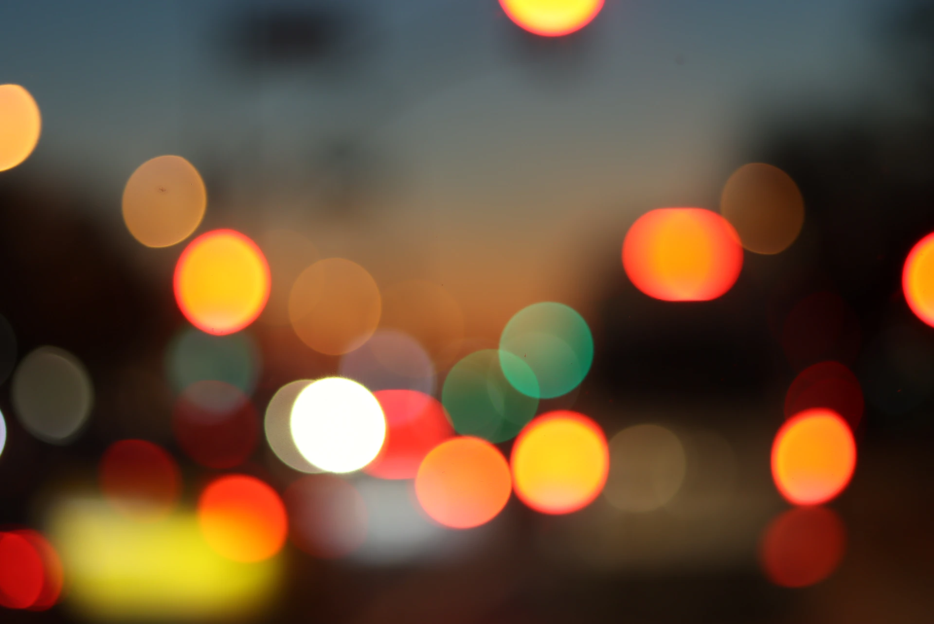 a blurry photo of a city street at night