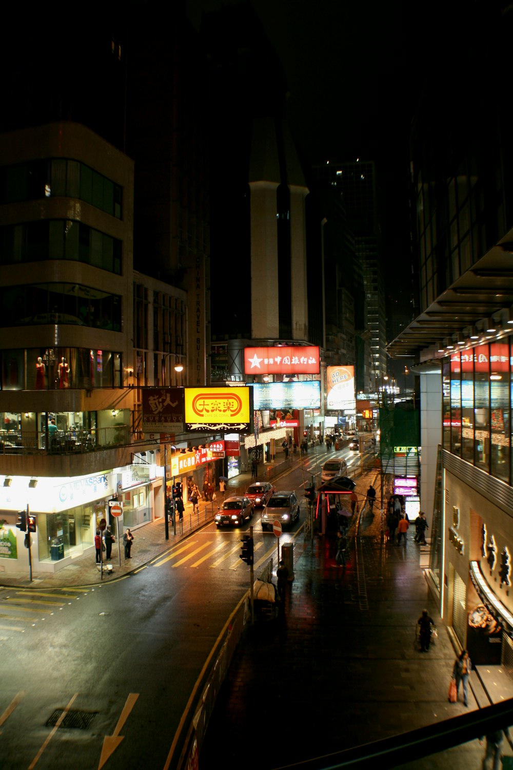 a city street at night with a lot of traffic