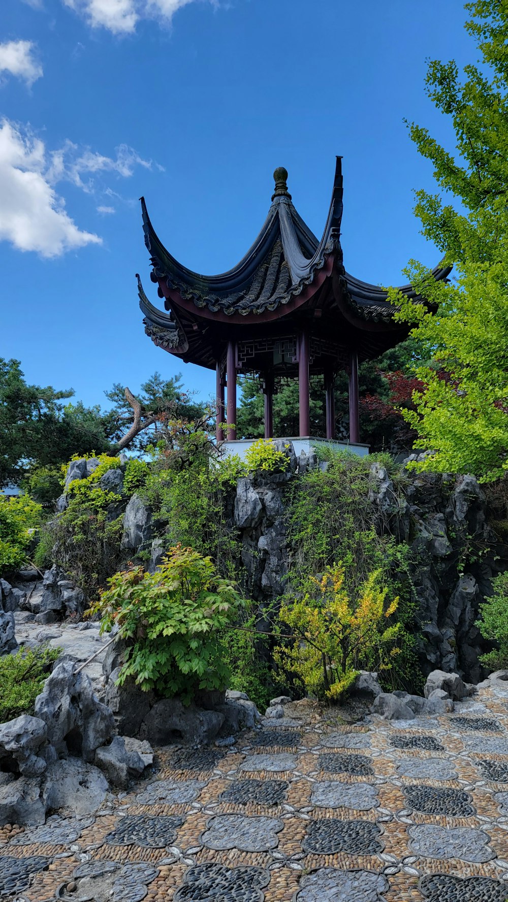 a pagoda in the middle of a garden