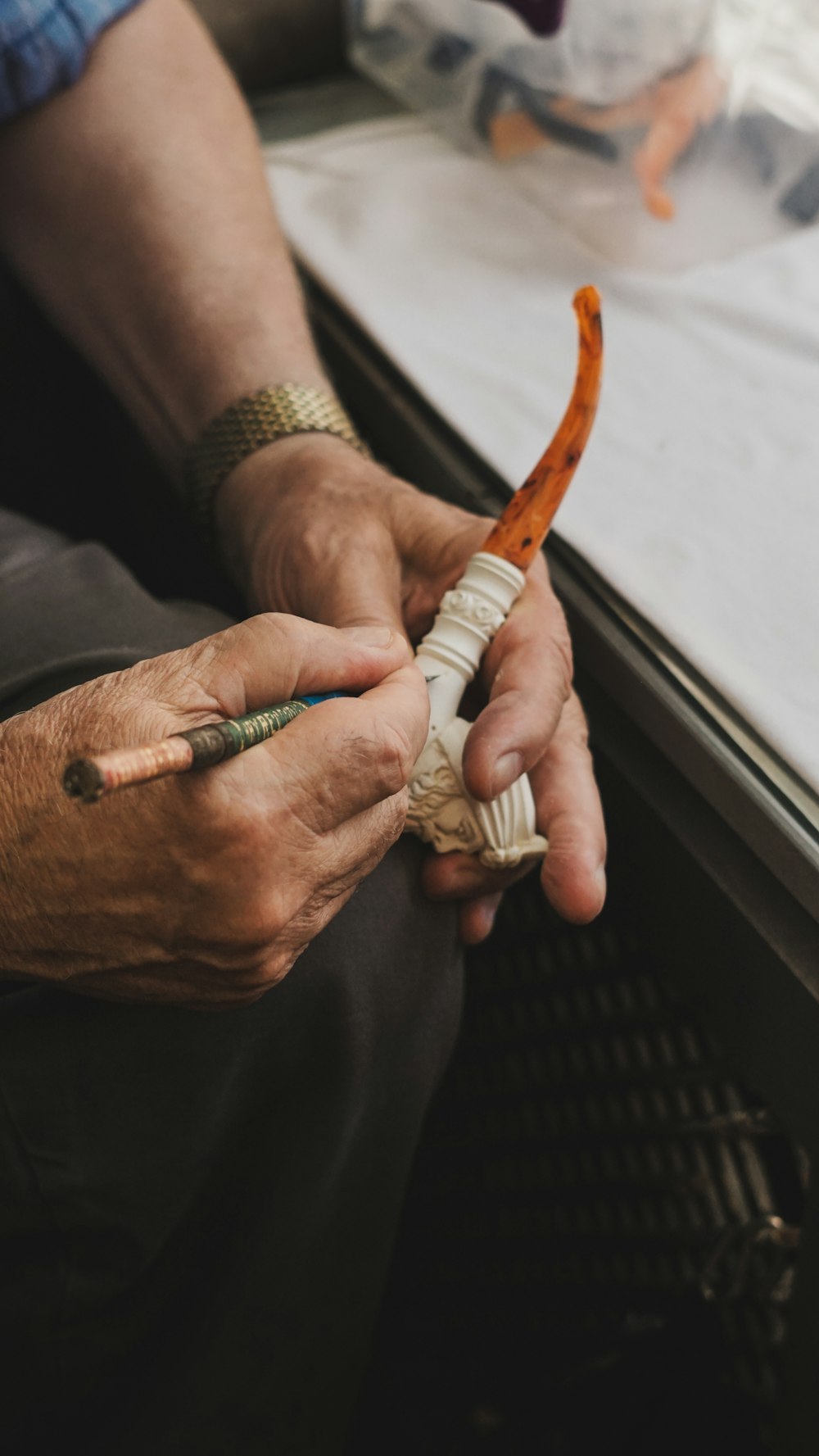 a man holding a pair of scissors in his hands