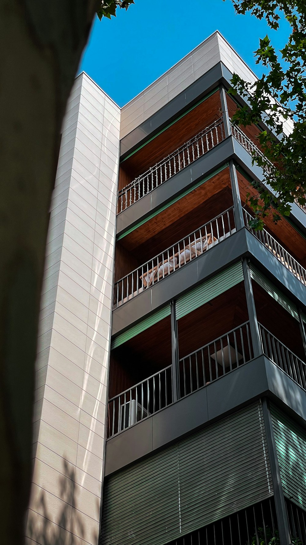 a tall building with balconies and balconies on the balconies