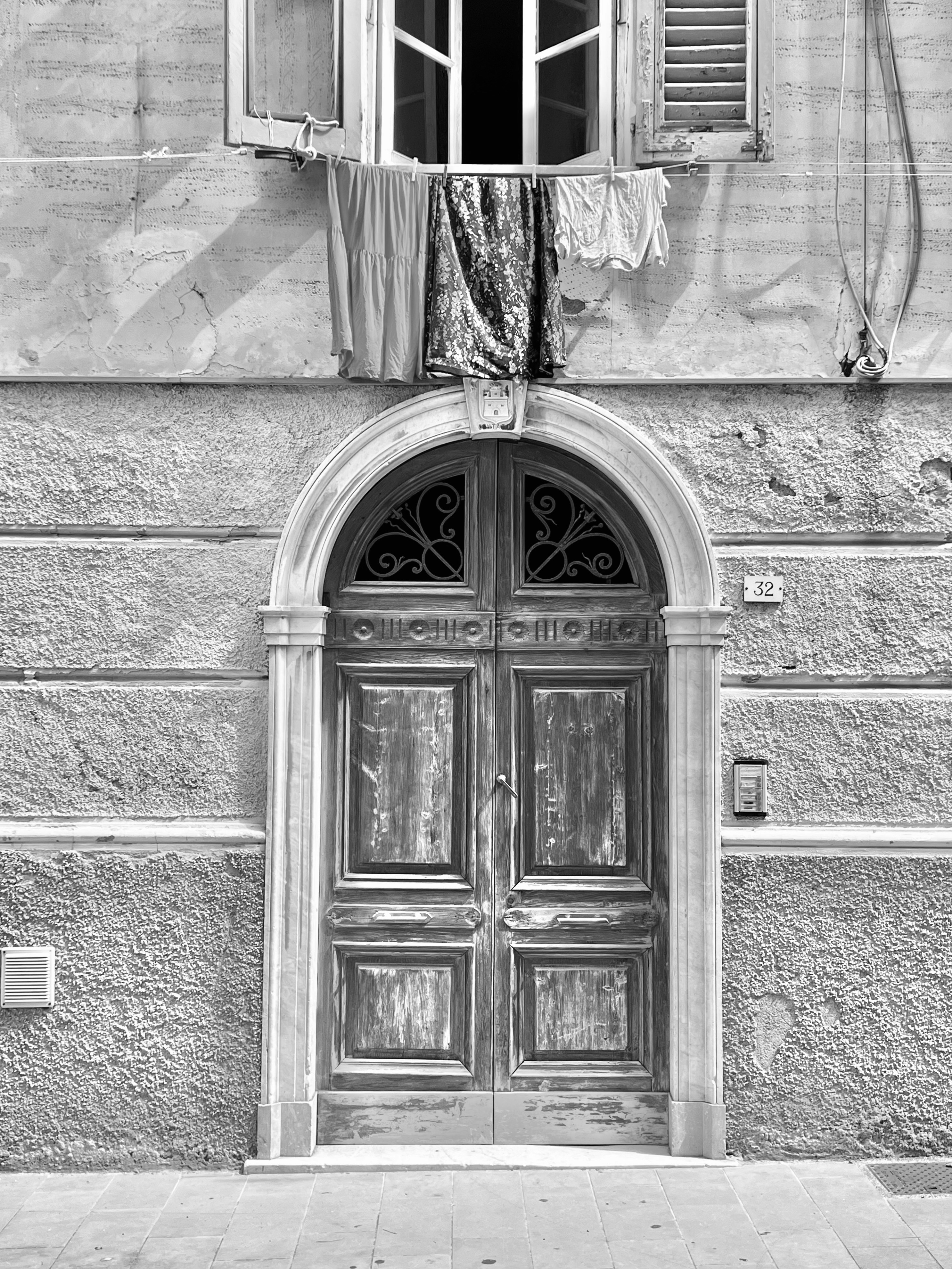 a black and white photo of an old building