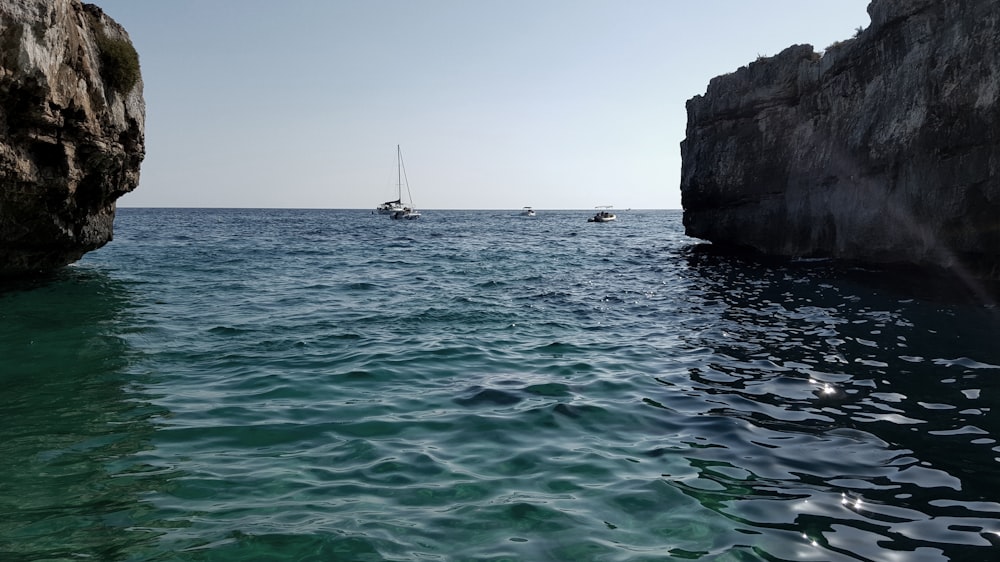 a couple of boats are out in the water