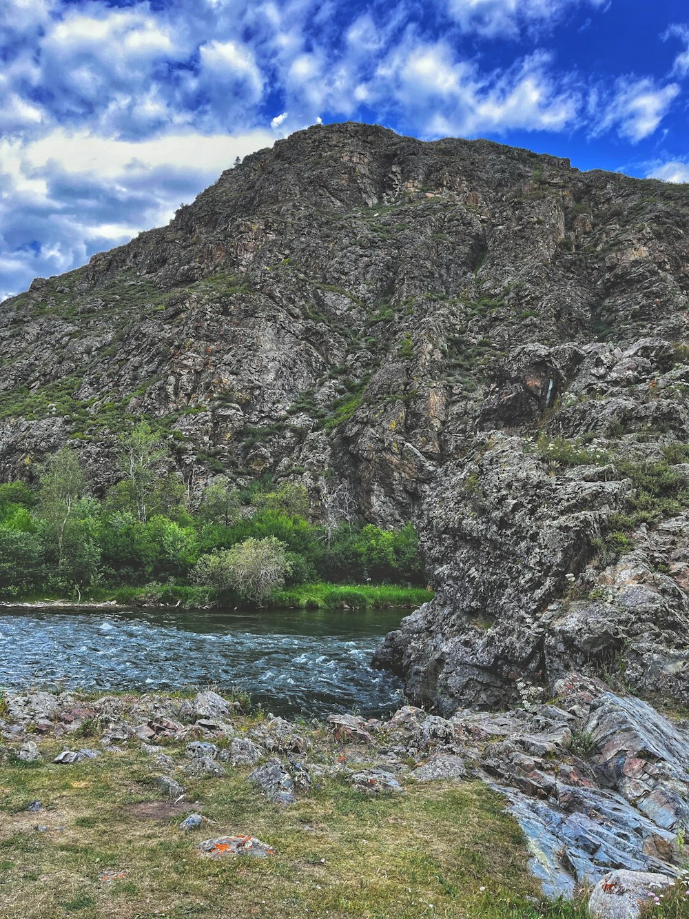 a mountain with a river in the middle of it