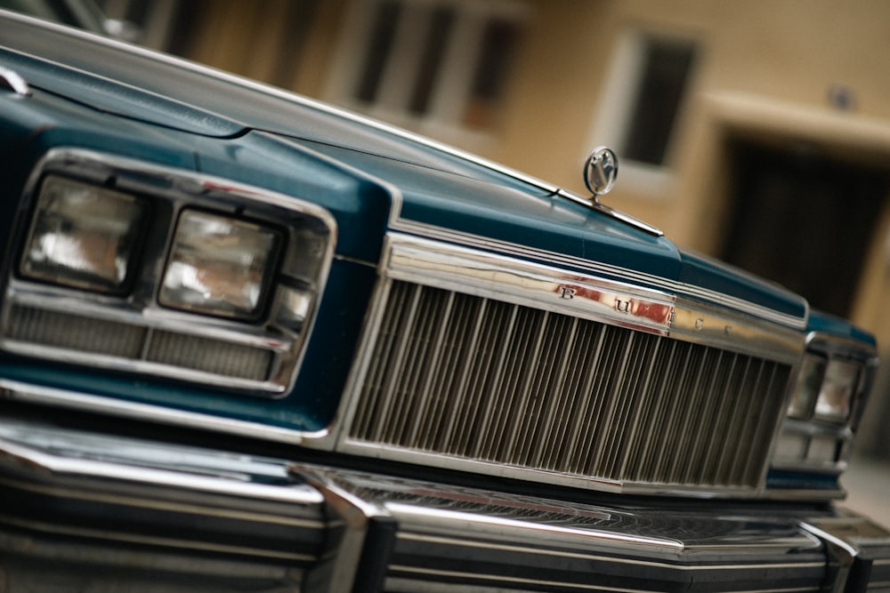 a close up of a car parked on the side of the road