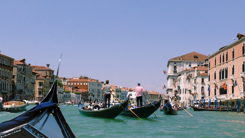 a couple of boats that are sitting in the water