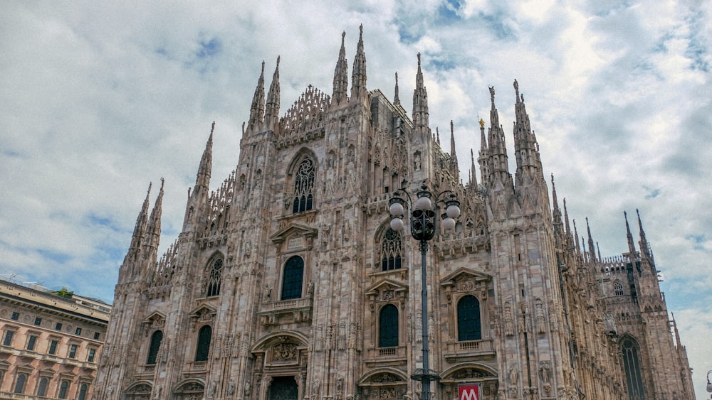 a large cathedral with a clock on the front of it