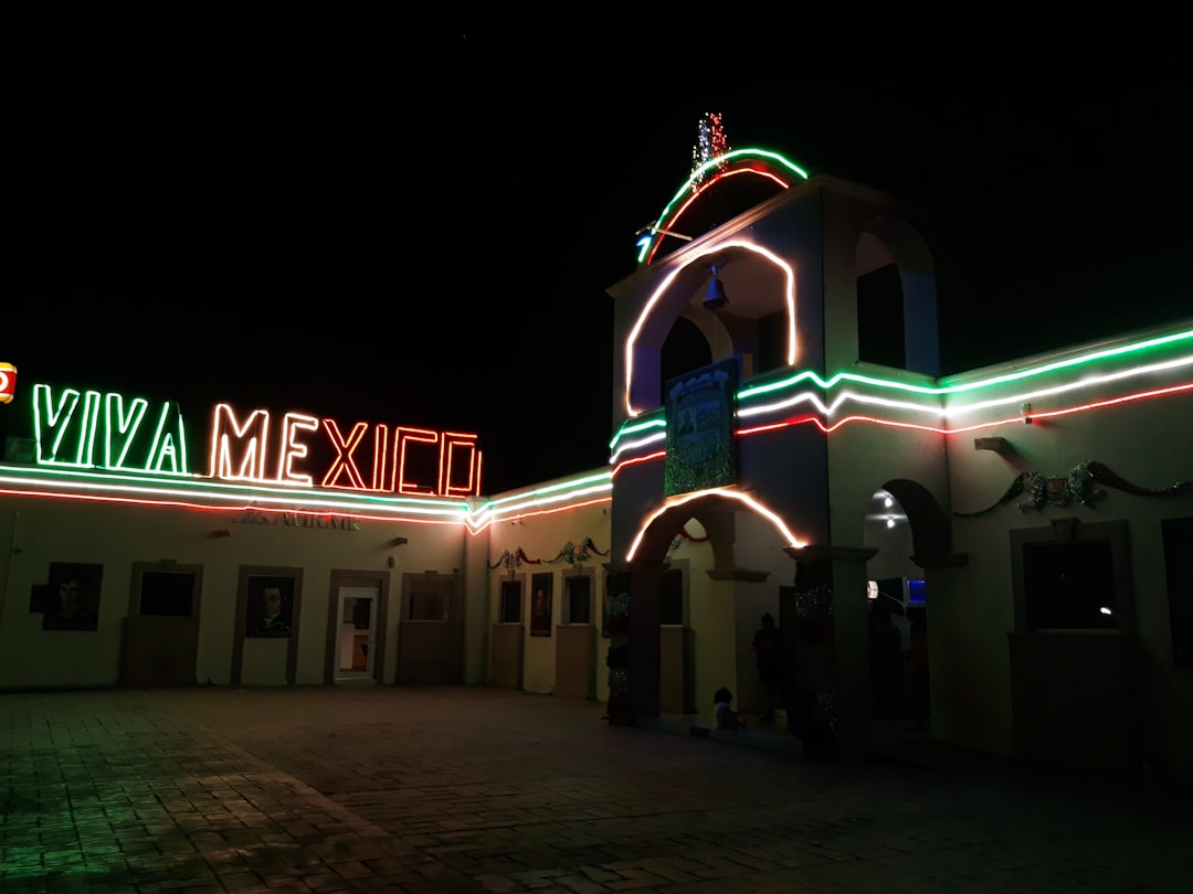 a building that has a lot of lights on it,