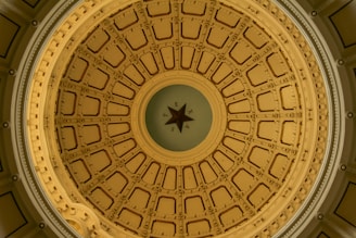 the ceiling of a building with a star on it