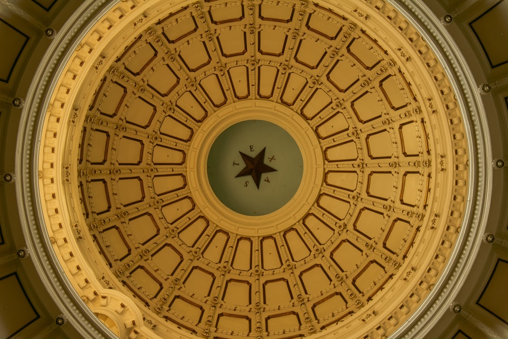 the ceiling of a building with a star on it
