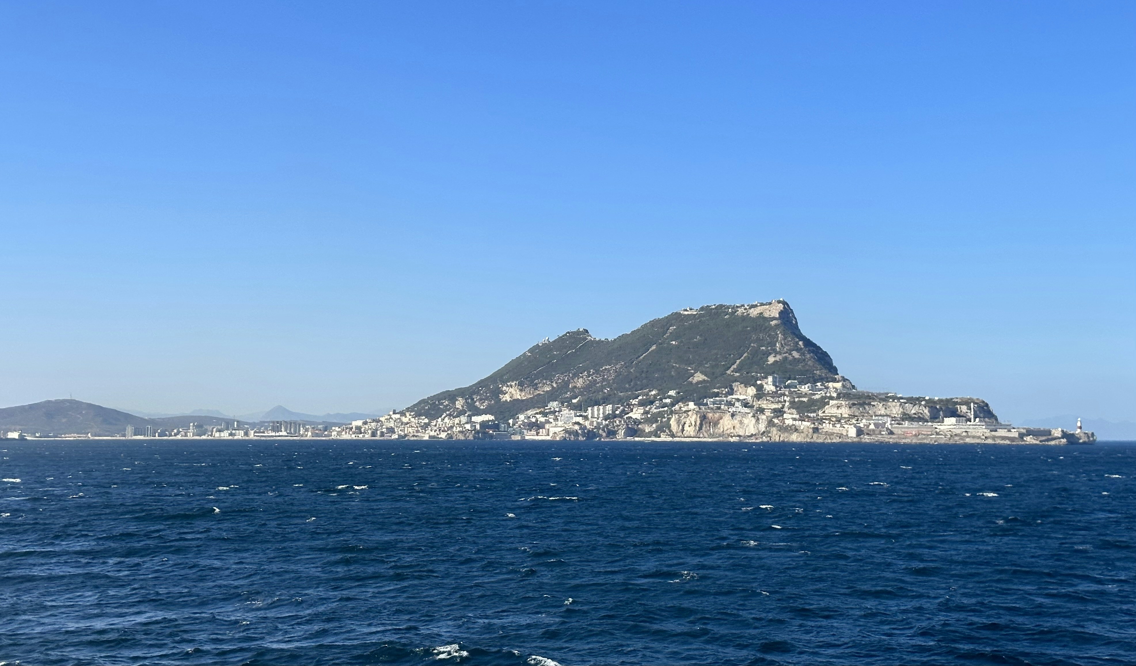 a large island in the middle of a body of water