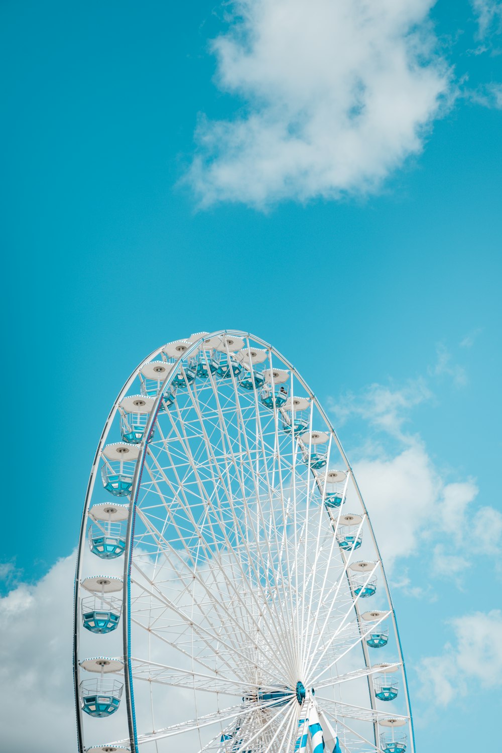 a ferris wheel with a blue sky in the background