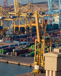 a large crane is in the middle of a large body of water