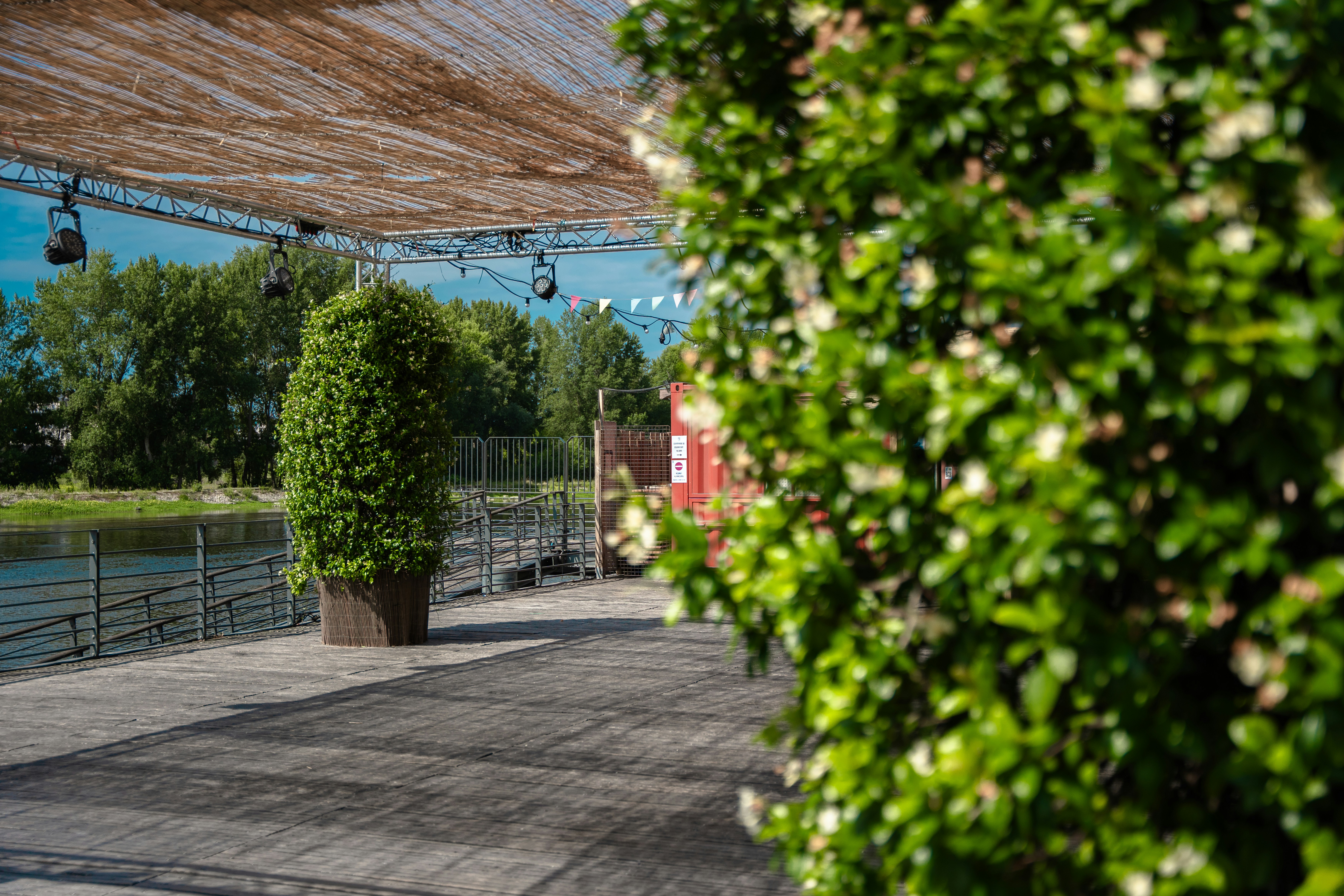 a patio area with a large umbrella over it