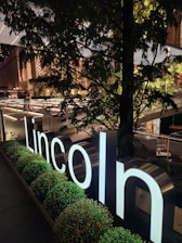 A welcoming office space with the Abraham Lincoln Karri logo prominently displayed.