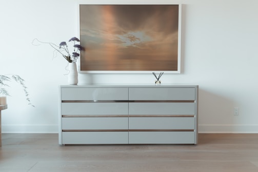 A neatly assembled IKEA dresser with smooth edges and perfectly aligned drawers in a cozy Montgomery living room.