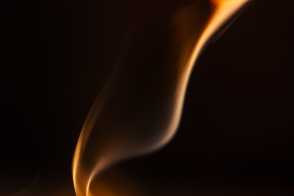 a close up of a fire with a black background