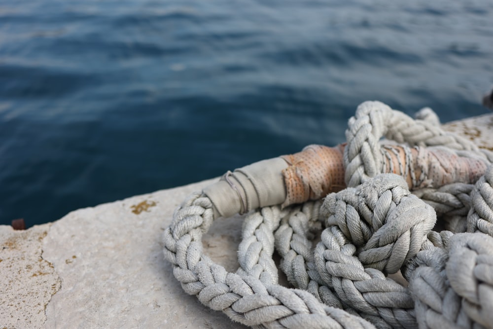 a close up of a rope on the side of a boat