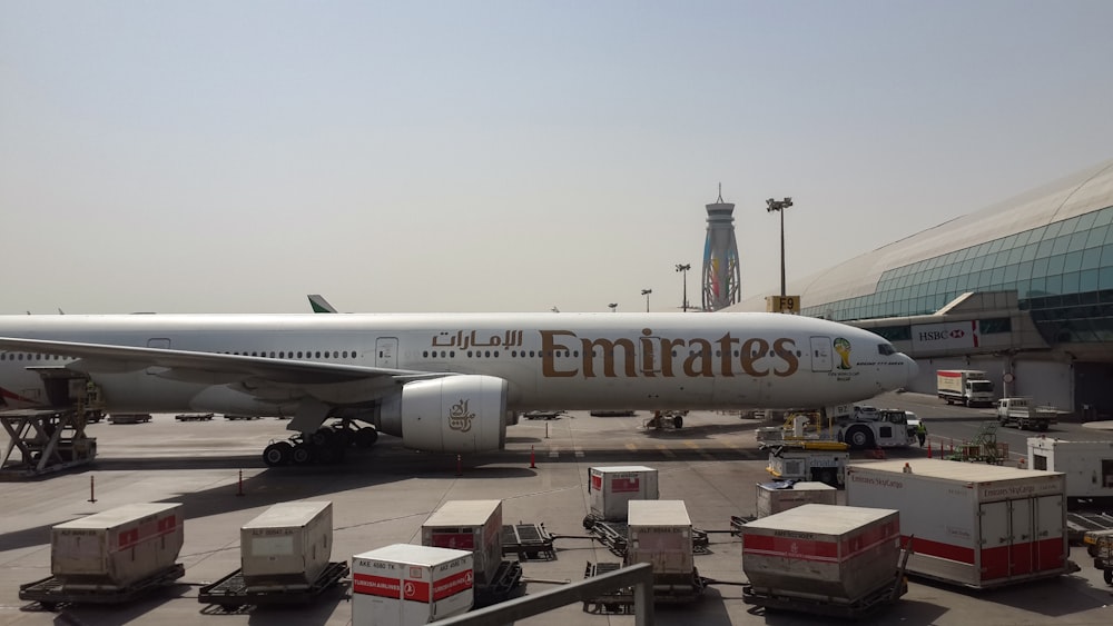 a large jetliner sitting on top of an airport tarmac