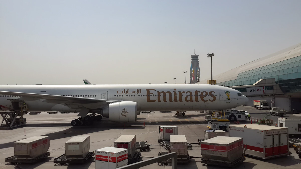 A widebody airliner on the ground at a Gulf airport with the Dubai skyline behind it