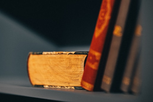 Close-up of vintage books and handwritten notes representing cultural archives.