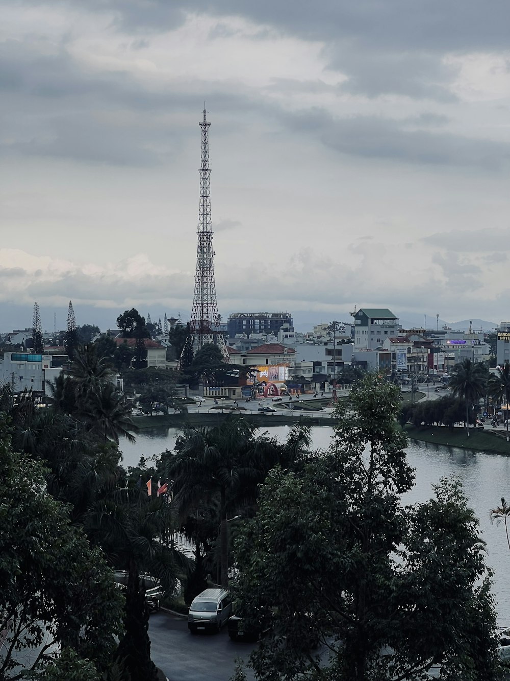 a view of a city with a tower in the background