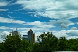 The exterior of PMA LLP's manufacturing plant surrounded by blue sky.