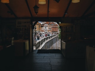 Front view of montanashop storefront on Sint Antoniesbreestraat bustling with customers picking up orders.