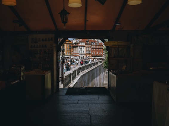 Front view of montanashop storefront on Sint Antoniesbreestraat bustling with customers picking up orders.