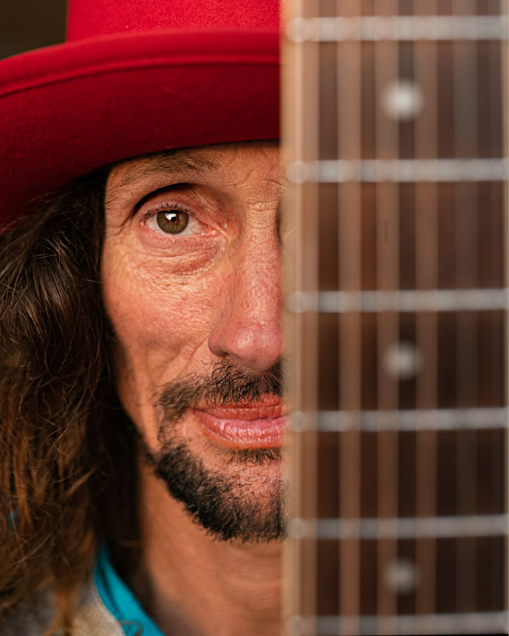 a close up of a person with a guitar