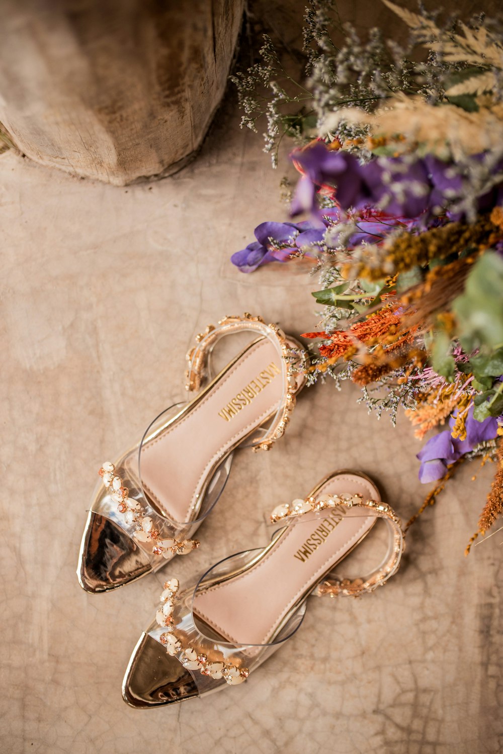 a pair of shoes sitting on top of a wooden table