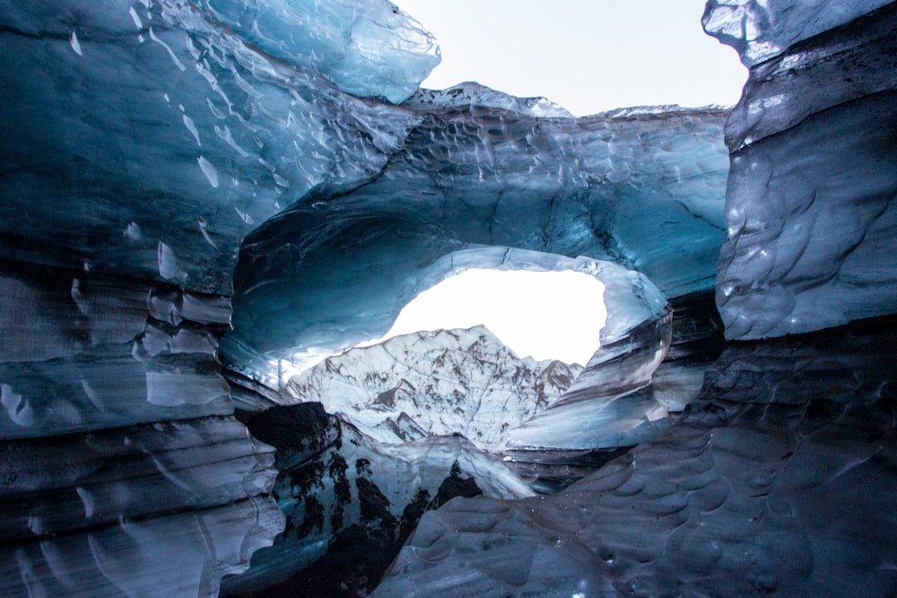 a large ice cave in the middle of a mountain
