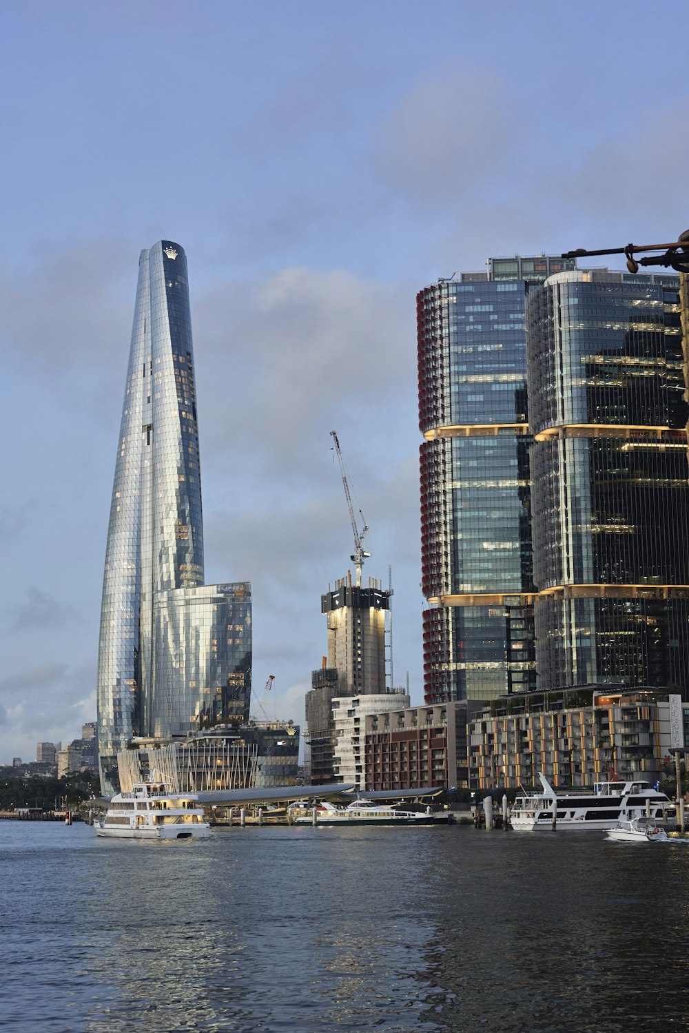 a large body of water next to tall buildings