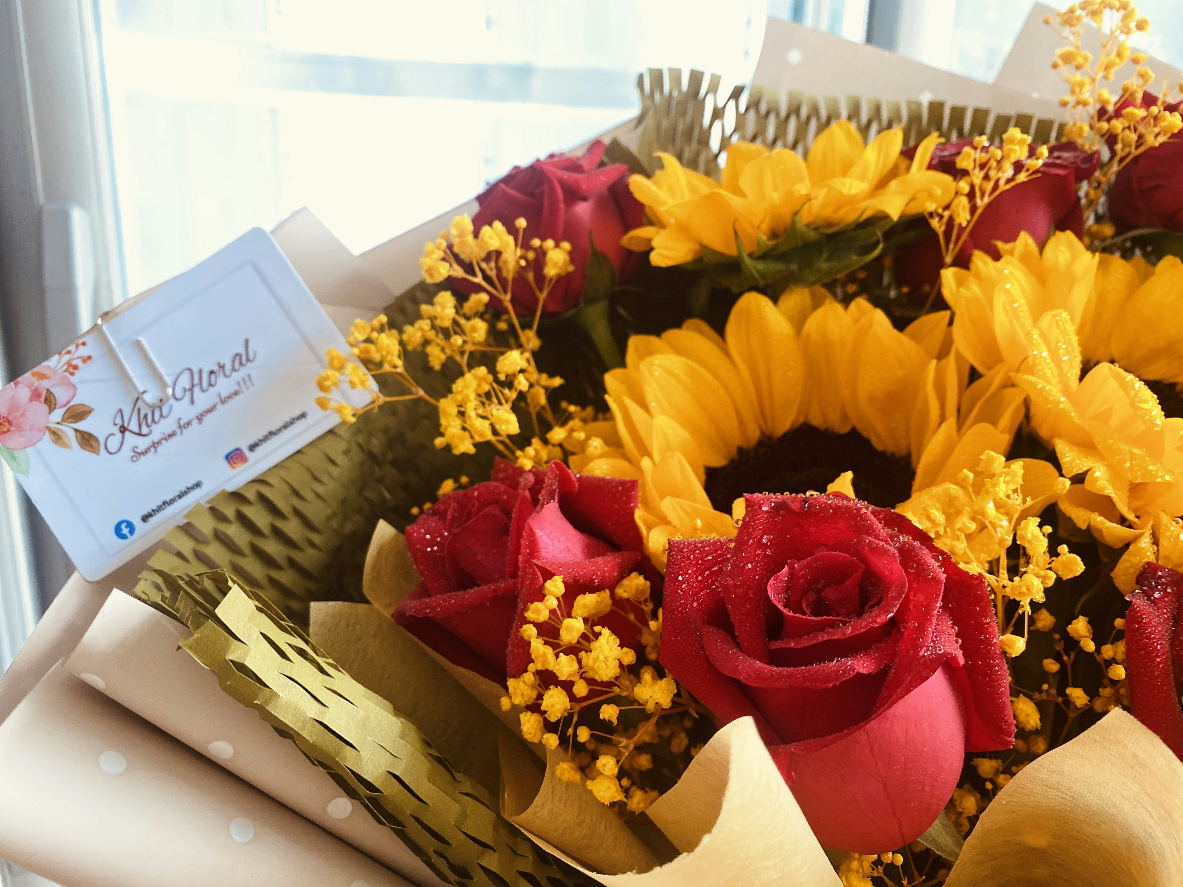Bright summer sunflower and yellow rose cheerful bouquet